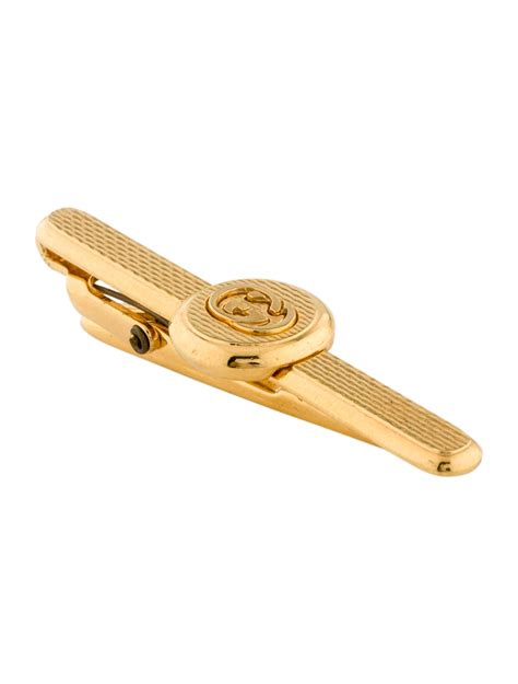 gold gucci tie pin|Gucci suspenders.